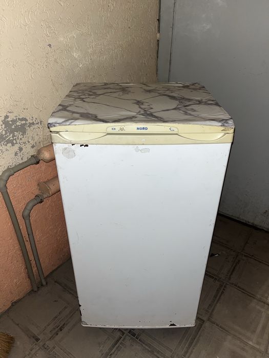 Холодильник .7000