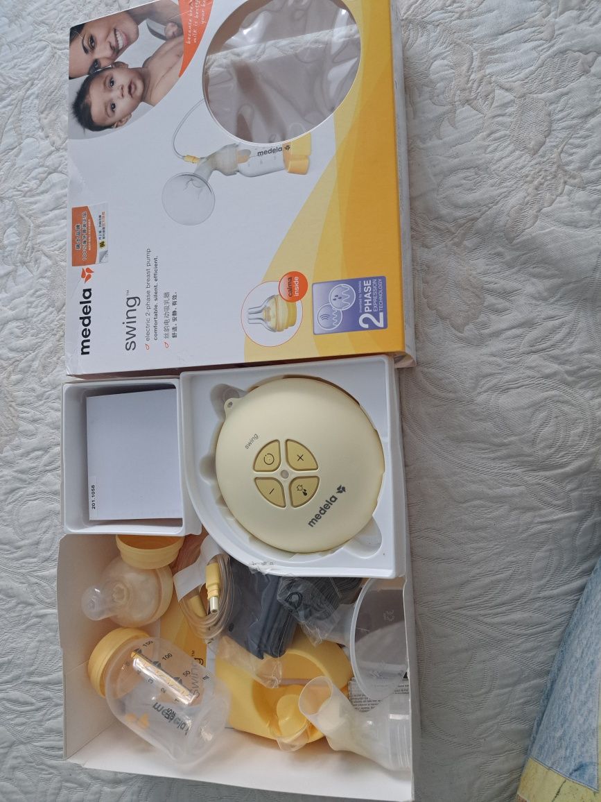 Молокоотсос электрический от фирмы Medela