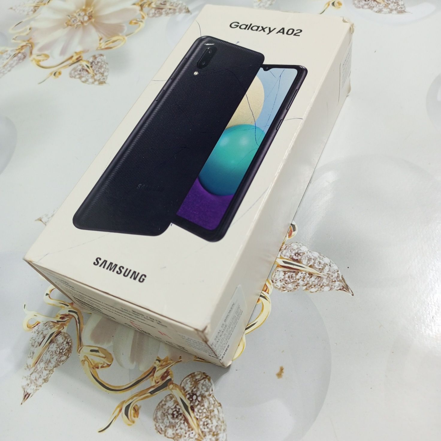 Телефон Samsung A02