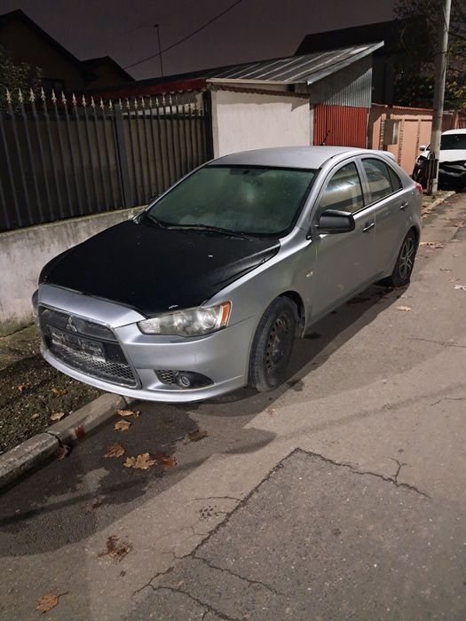 Dezmembrez Mitsubishi lancer benzina
