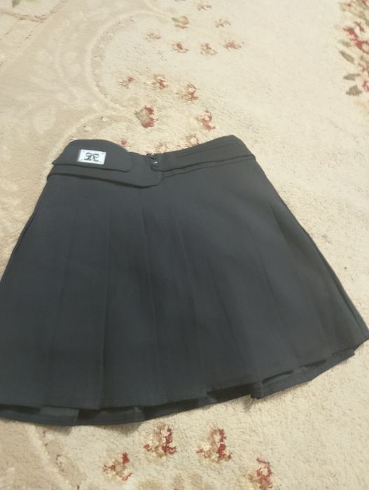 Продам юбку теплая и плотный материал новая.обувь новая зимняя