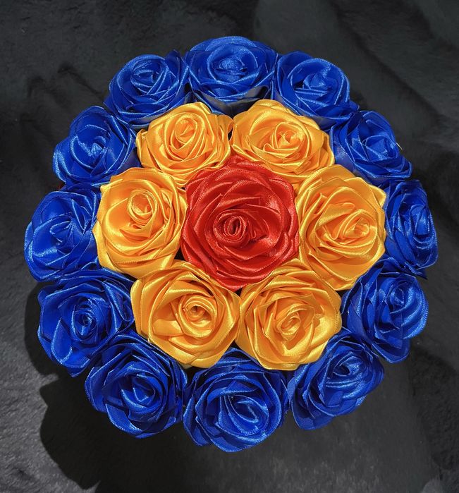 Buchete și aranjamente din flori de satin