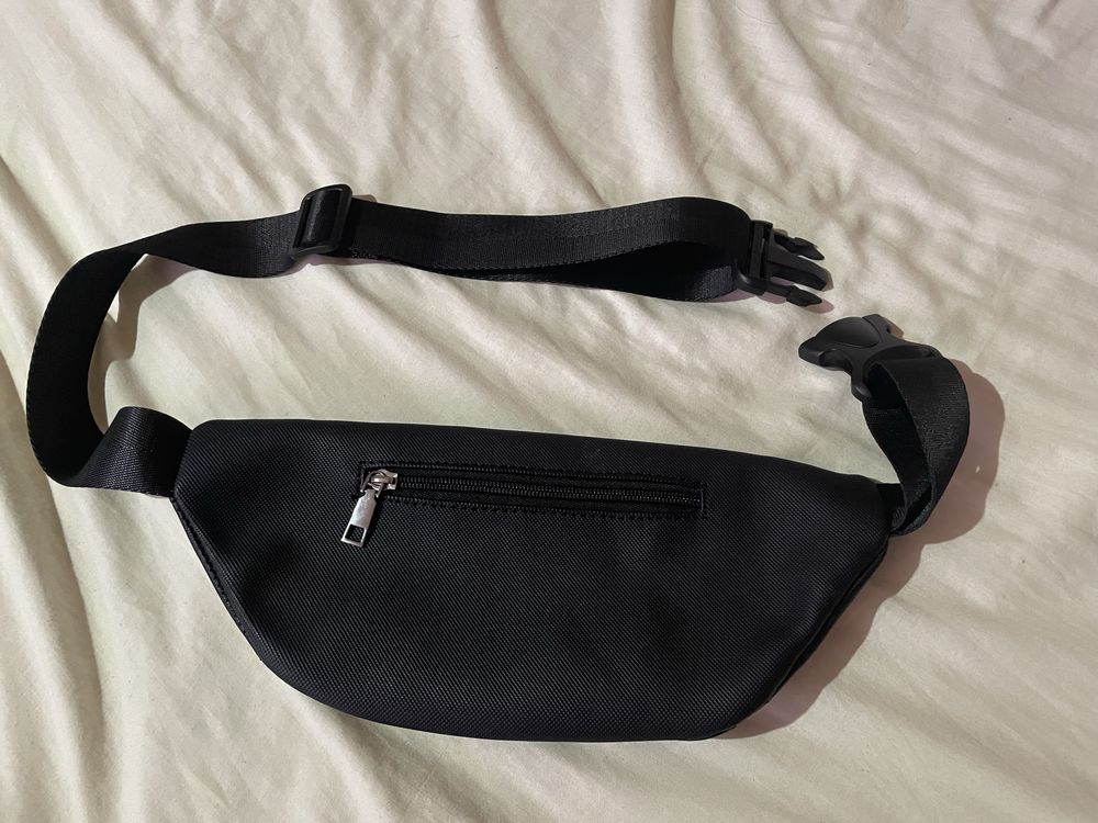 vand borseta Lacoste originala