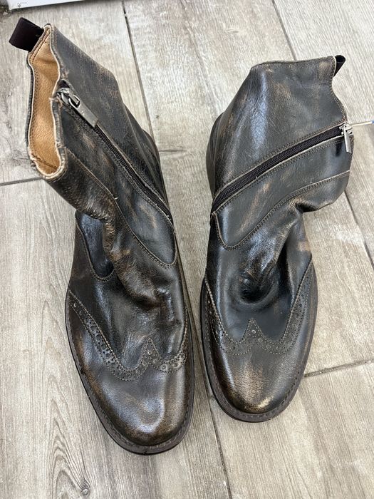 Vând ghete de piele maro.