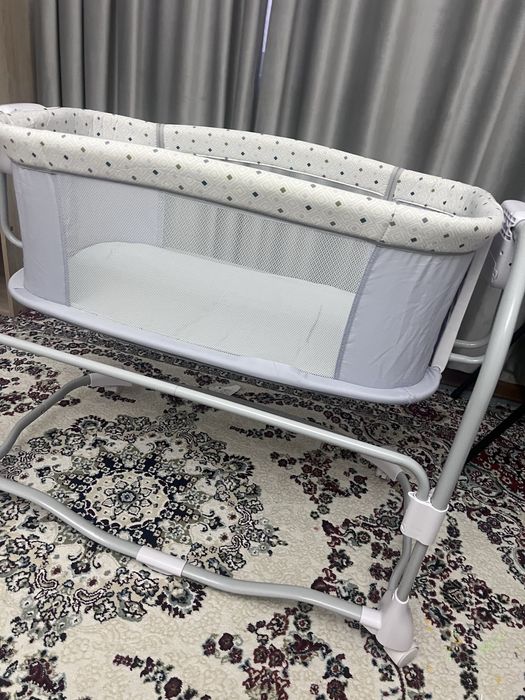 Кровать манеж с механизмом качания