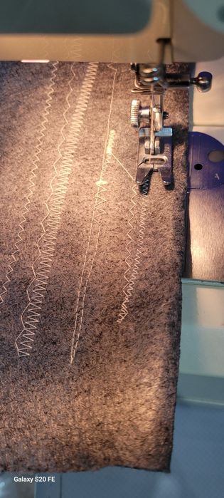 Mașina de cusut Singer