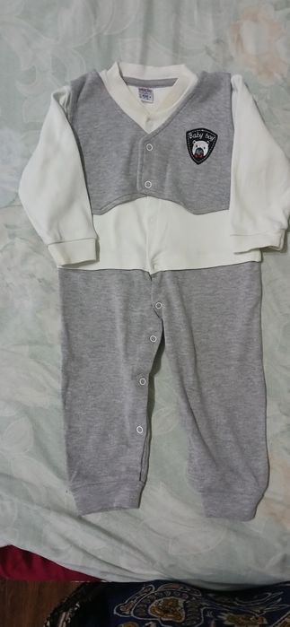 Продам тёплые комбинезон для новорождённого