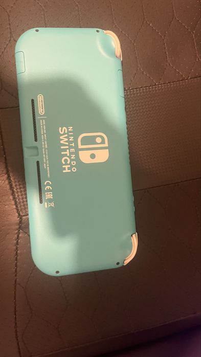 Nintendo Switch Lite + Joc + Husa calatorie