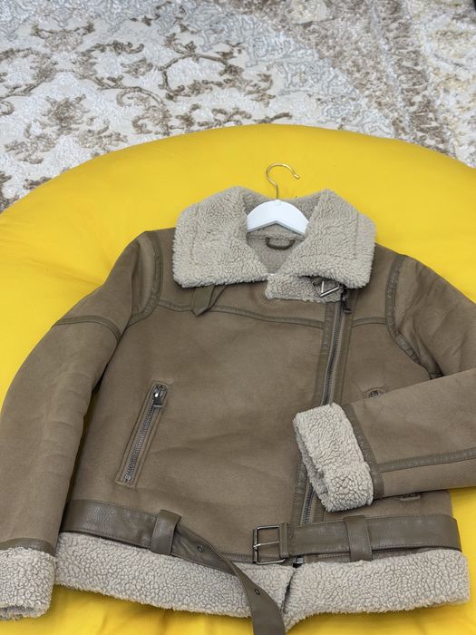 Женская дублёнка…….