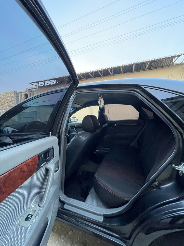 Lacetti 1.8 qora rang 2 poz