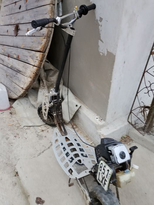 Vând trotineta Uber Scott 70x 71cc