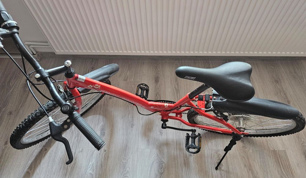 Bicicleta Rich sport,culoare roșie,stare foarte buna