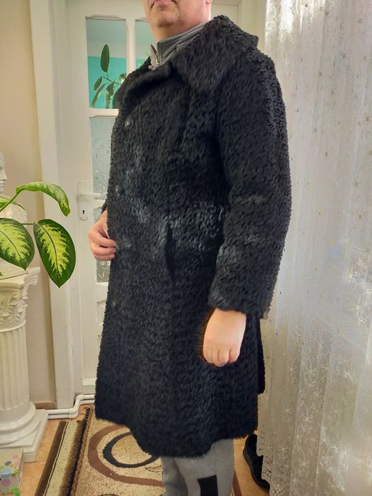 Haina de blana artificiala.Astrahan