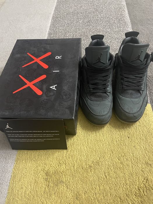 Jordan 4 Black Kaws