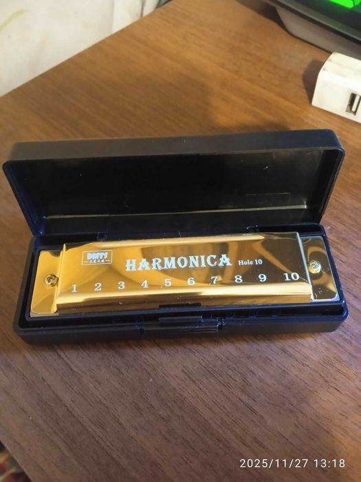 Губная гармошка .