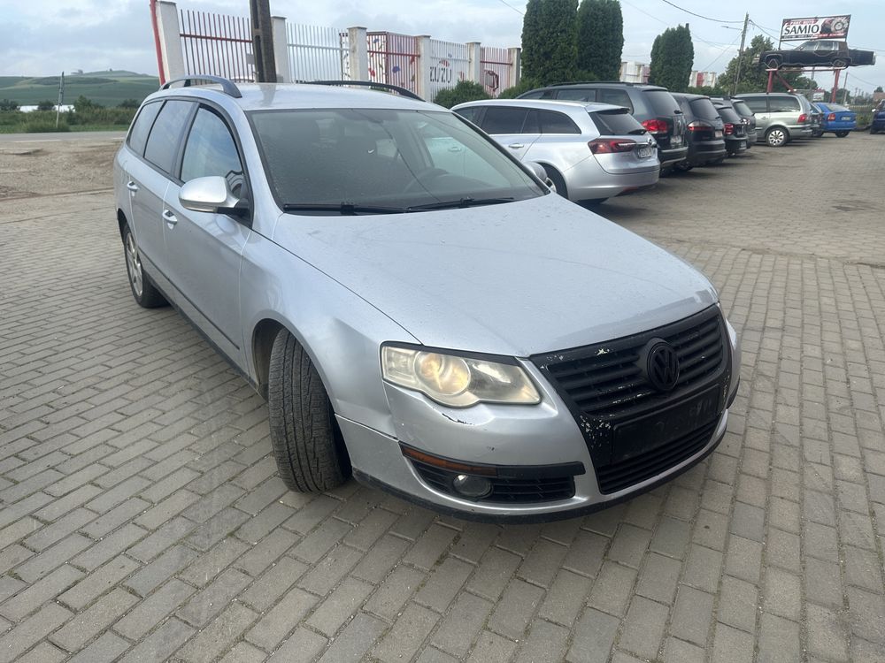 Piese Passat 2.0 Tdi BMW far capota