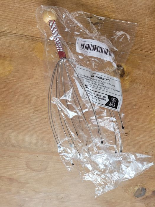 Dispozitiv pentru masajul scalpului