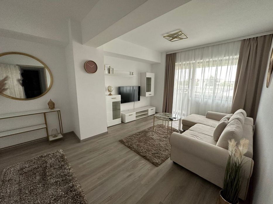 Inchiriez apartament nou 2 camere + loc parcare subteran