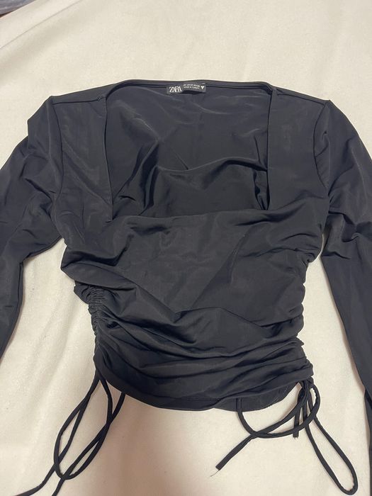 Блузи пуловери топове