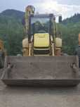 Buldoexcavator Komatsu