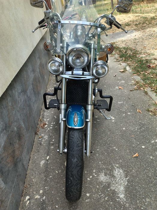 Kawasaki en 500 la pachet cu o bicicletă Canyon Torque ES.