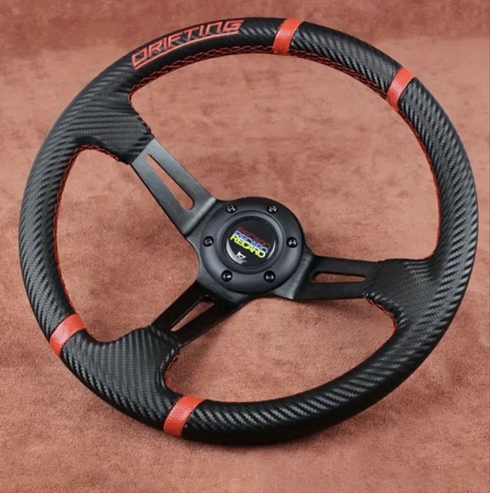 прдава се  ЧИСТО НОВО!! спортно дрифт кормило с карбонови влакна