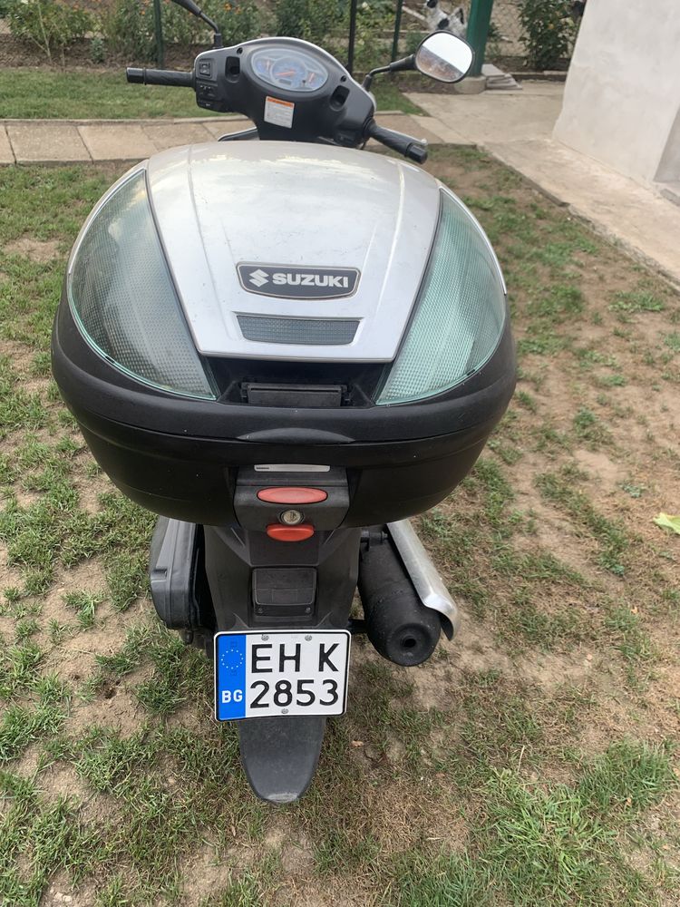 Скутер сузуки 125 кубика