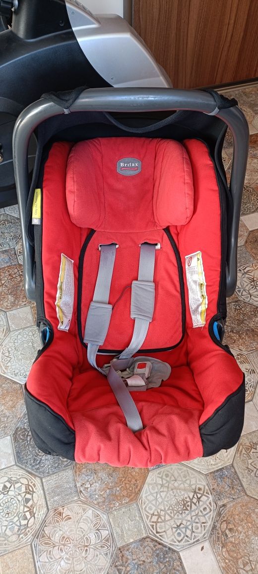 Scoică Britax Romer 0-13 kg cu prindere în centură cu spatele