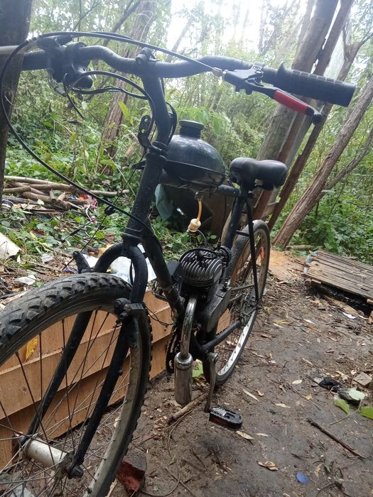 vând bicicleta cu motor de 100cc
