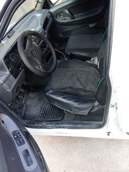 Nexia 1 sotiladi, 2003 yili, 3 krug yurgan, 4 balonlari yangi, metan