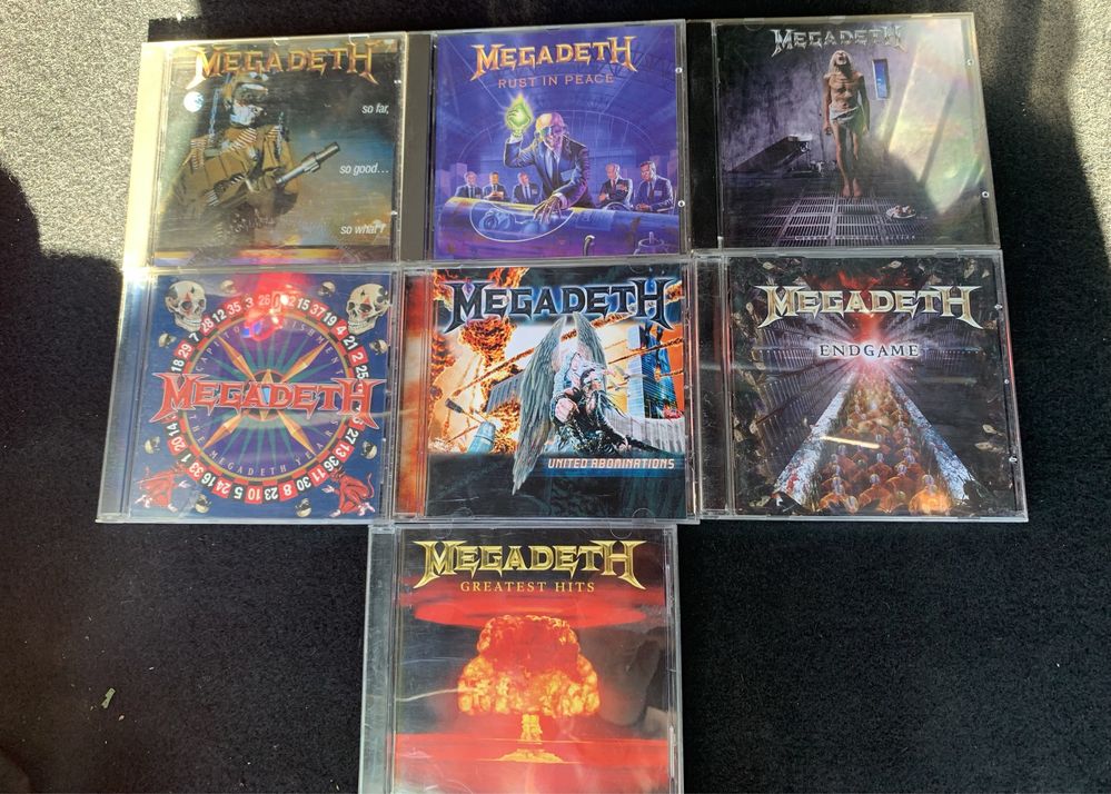 Cd rock/heavy originale acdc,Ozzy,queen, leppard,Alice Cooper,Megadeth