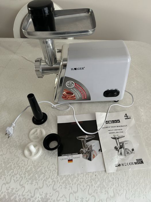 Электромясорубка Haeger и утюг Tefal