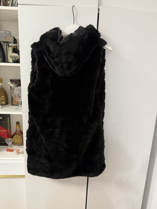 Vesta de blana .