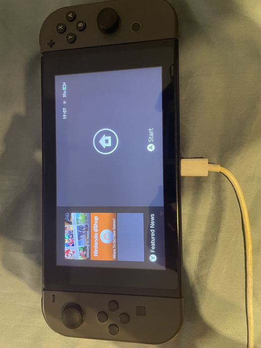 Nintendo switch + 7 jocuri, stare buna