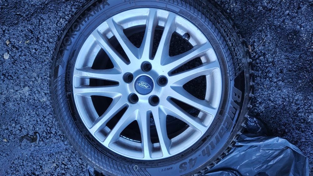 Set 4 anvelope 205/55 R15 allseason cu jante aliajFord + 20 piulite