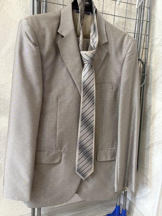 Отдам брючный костюм