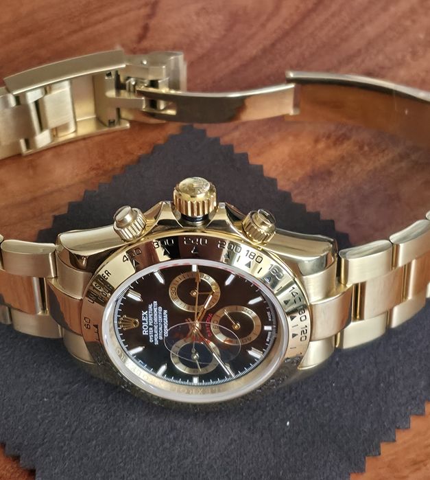 Rolex daytona gold