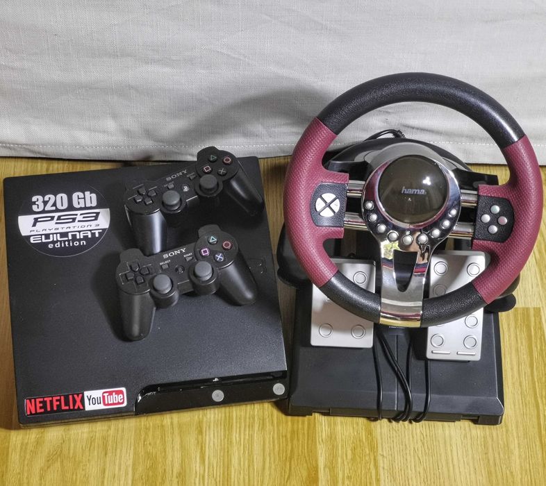 PS3 cu volan si pedale + 35 jocuri + 2 manete + Youtube + NETFLIX