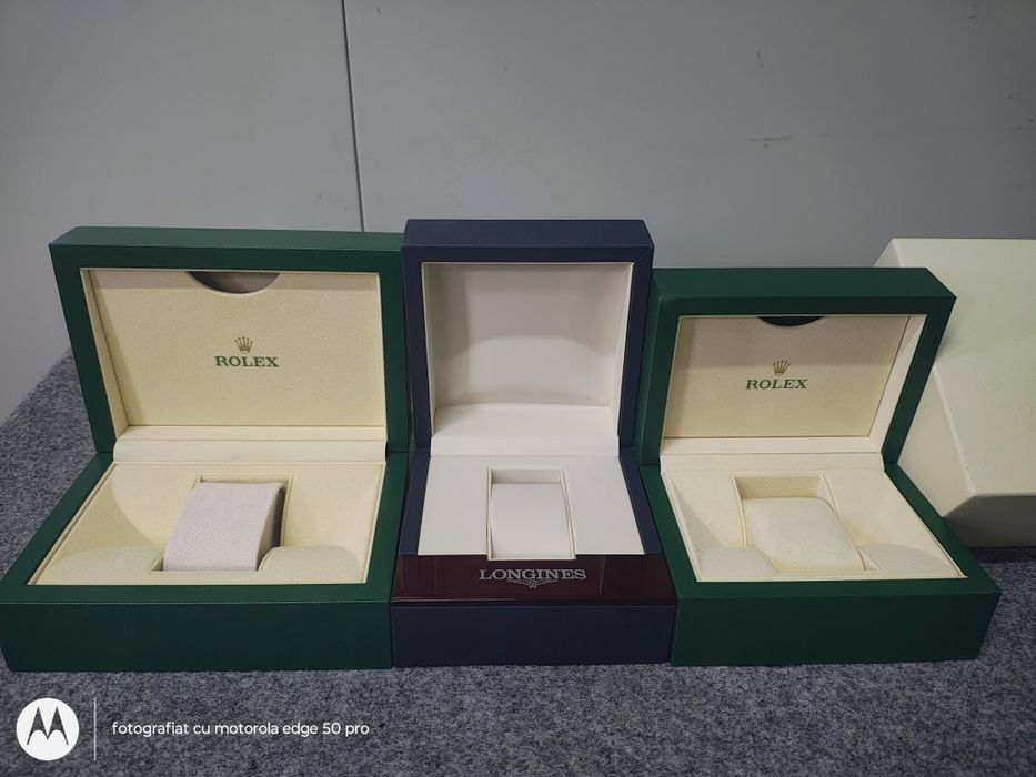 Cuti ceas Rolex și Longines