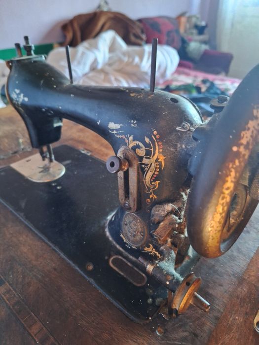 Mașină de cusut singer