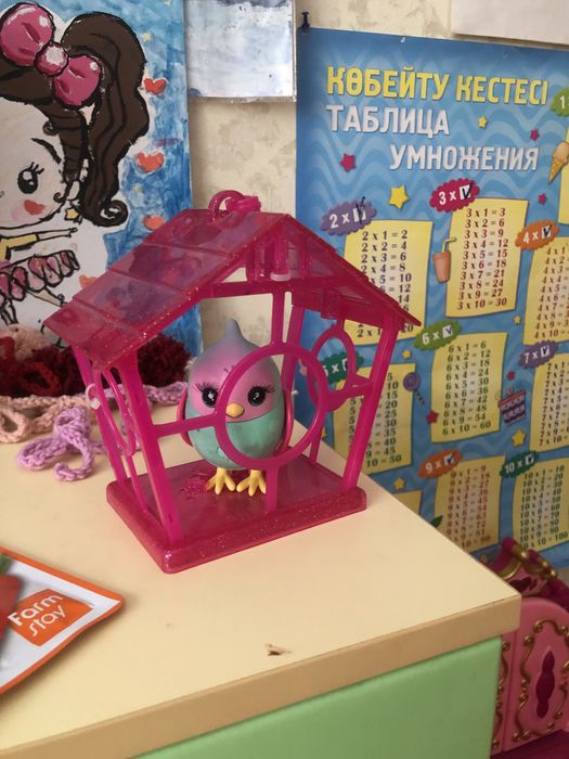Продам игрушку птичка в клетке