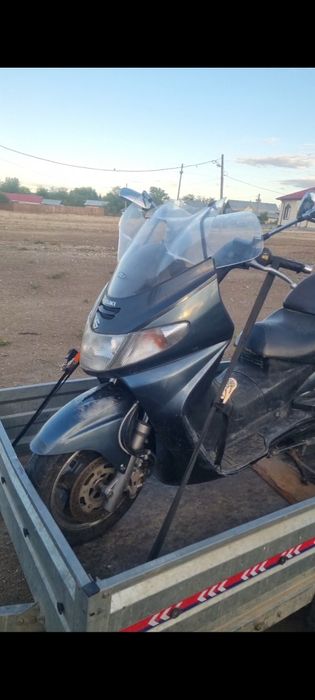 Suzuki Burgman ( nu honda,yamaha)