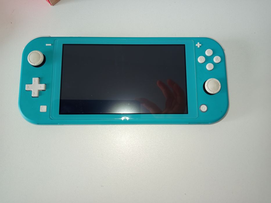Nintendo Switch Lite verde aproape nou + husă si folie
