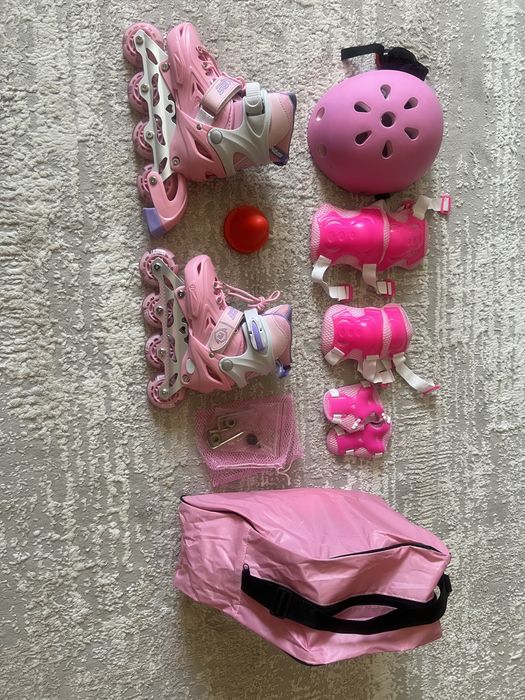 Роликовые коньки Новый