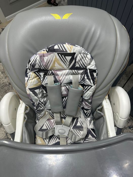 Детский стульчик для кормления фирма Текнум