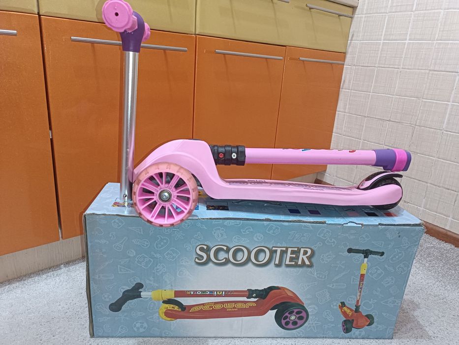 Самокат в отличном состоянии с упаковкой