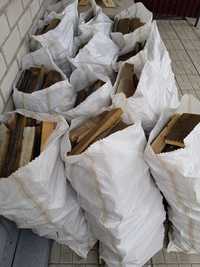 Продам дрова б/у в мешках 1200 тенге за мешок.