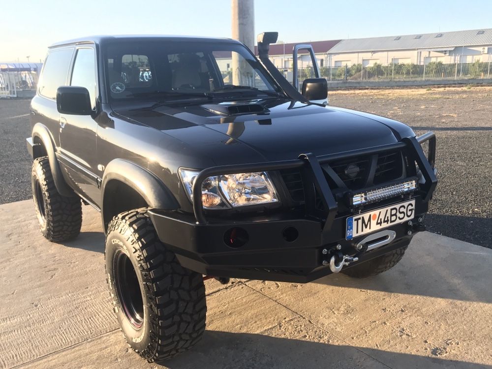 Bara fata Nissan Patrol Y61 cu suport troliu