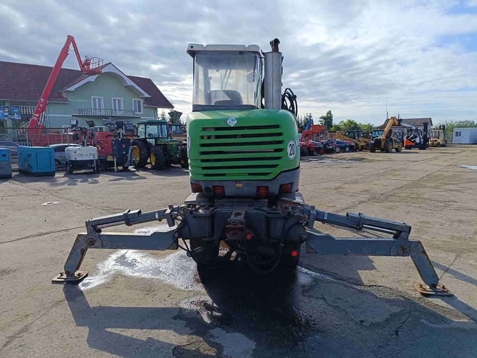 Excavator pe roți HANSA APZ 531 – 2003 – graifer hidraulic rotativ