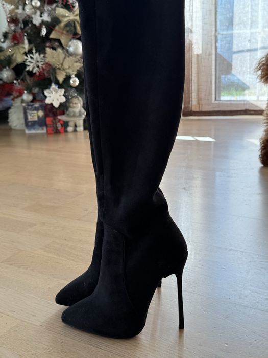 Високи ботуши на ток